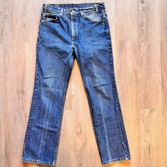 Vintage Levi’s 550 Dark Blue Denim orange tab