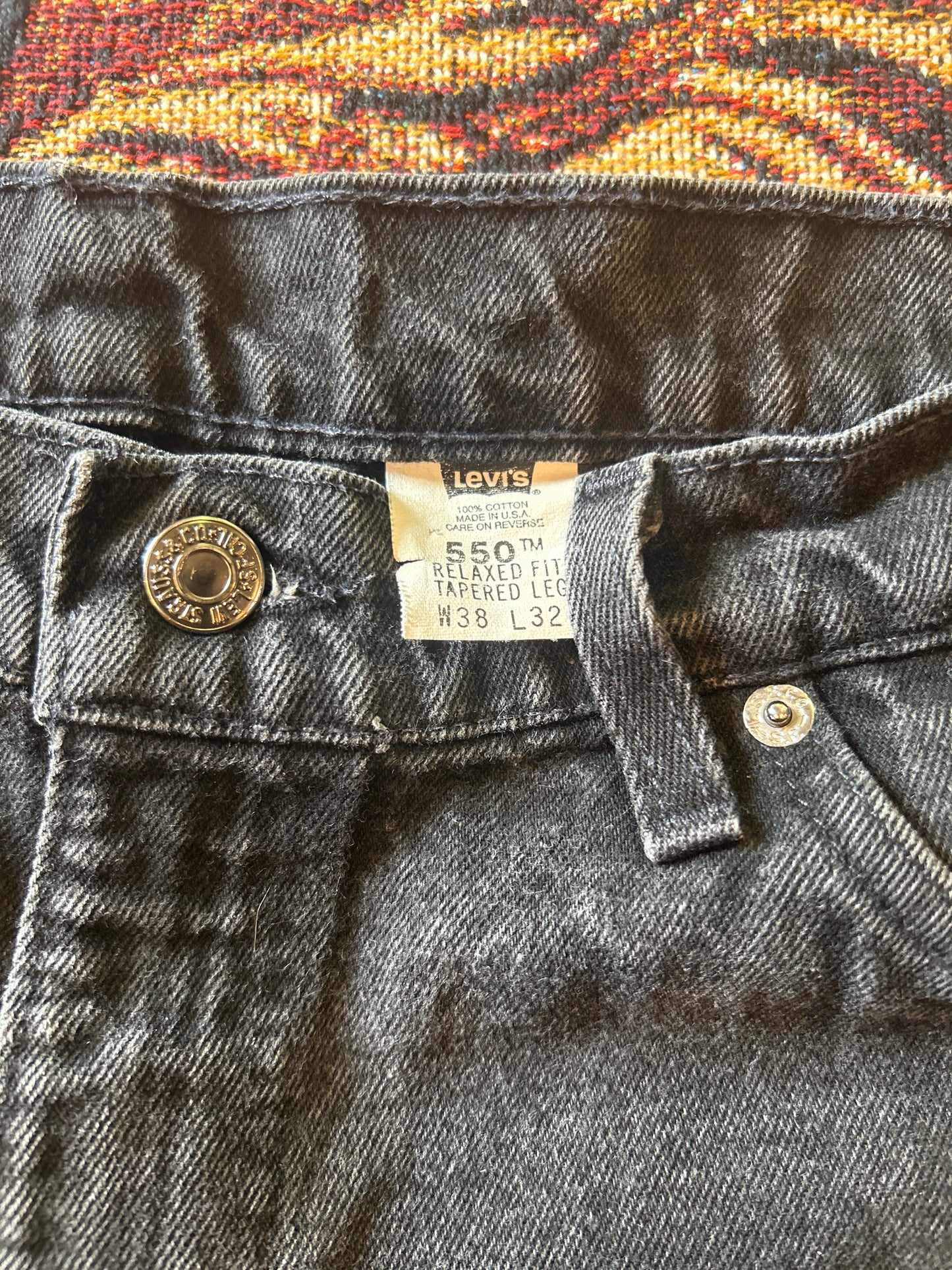 Vintage Black 550 Levi  (orange tag)