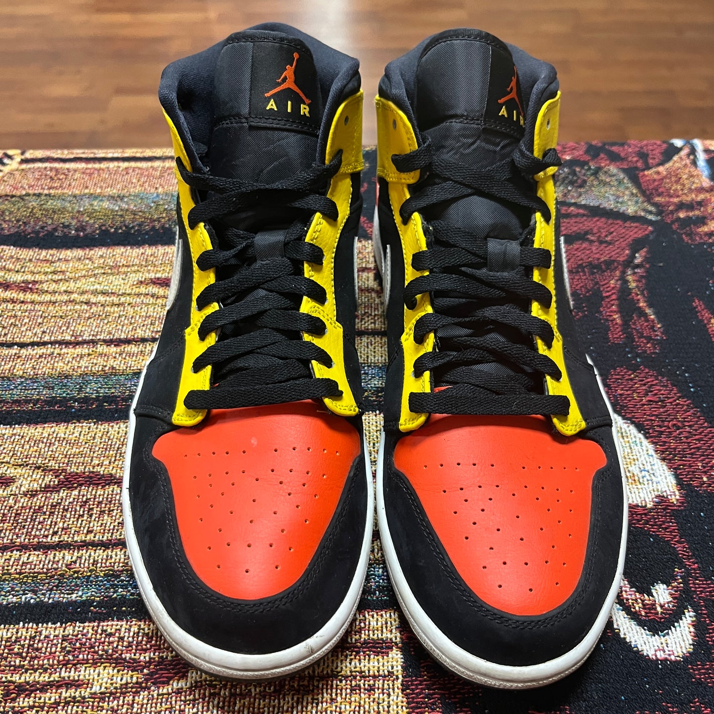 Jordan 1 Mid Black Amarillo Orange - Preloved